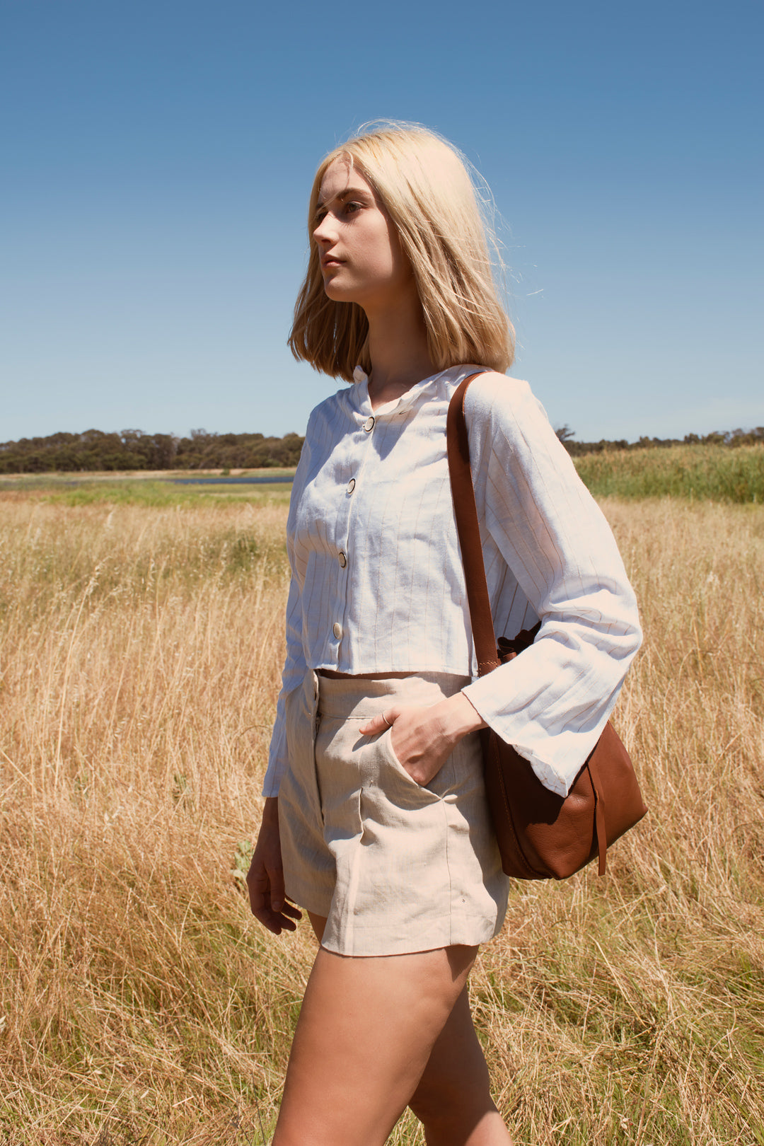 Beige pleated shorts