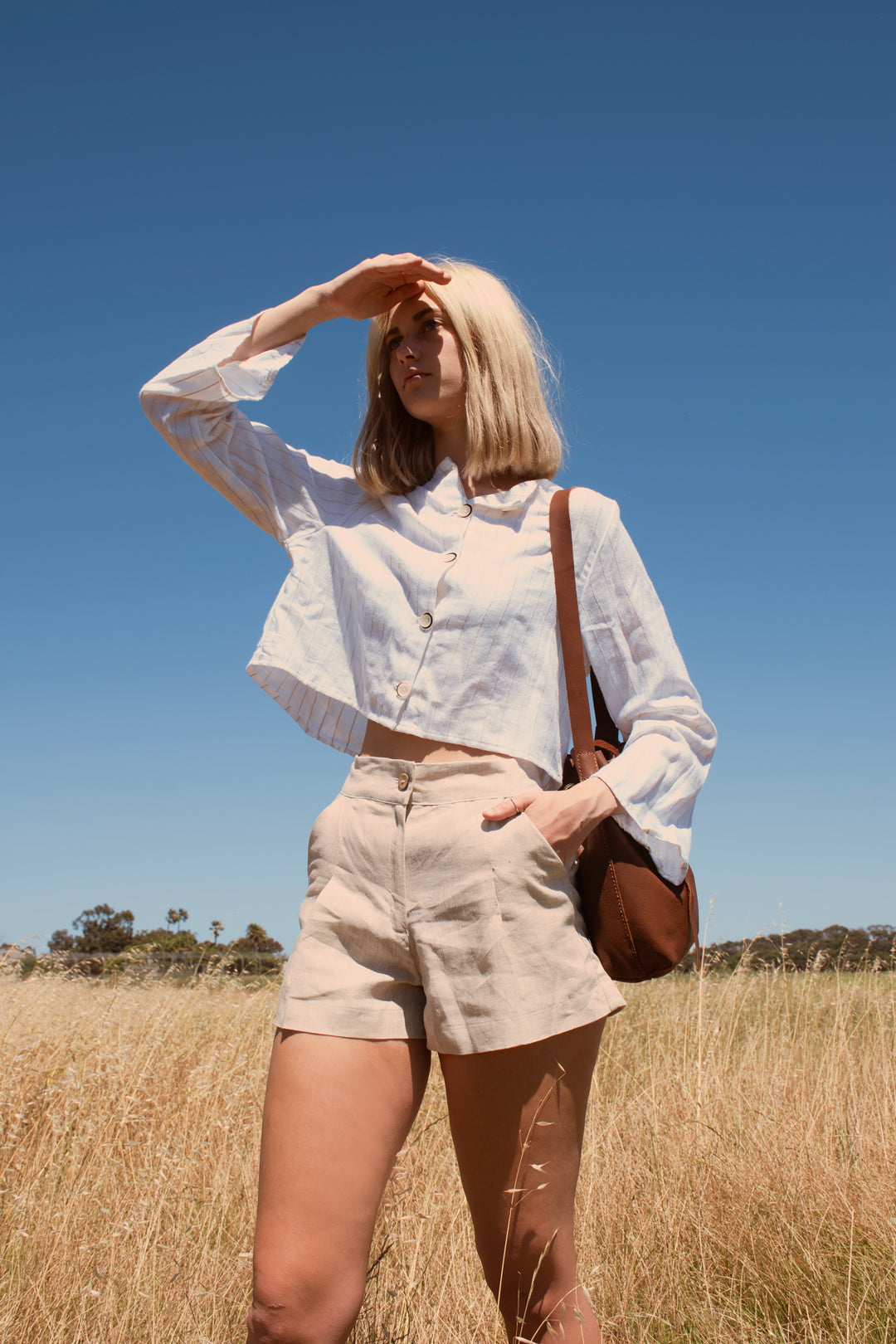 Beige pleated shorts